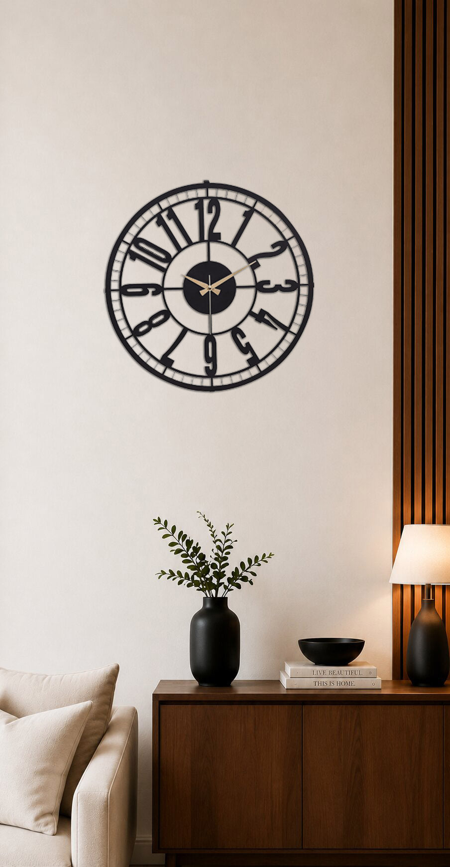 Decorative wall clock on a wall in a living room setting with a vase and lamp.