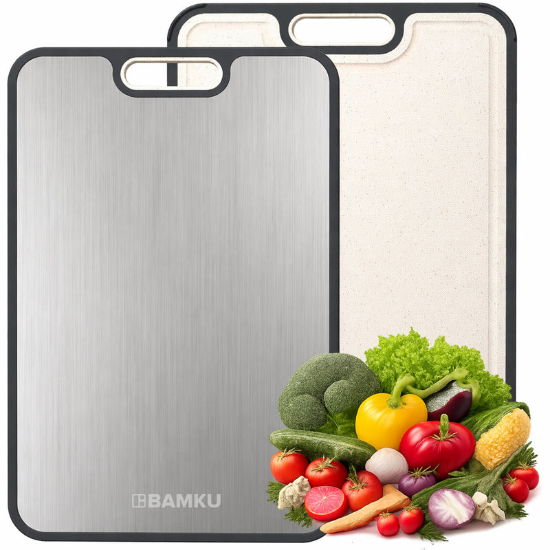 Two cutting boards, one silver and one white, with a variety of vegetables on a white background. The brand 'BAMKU' is visible.
